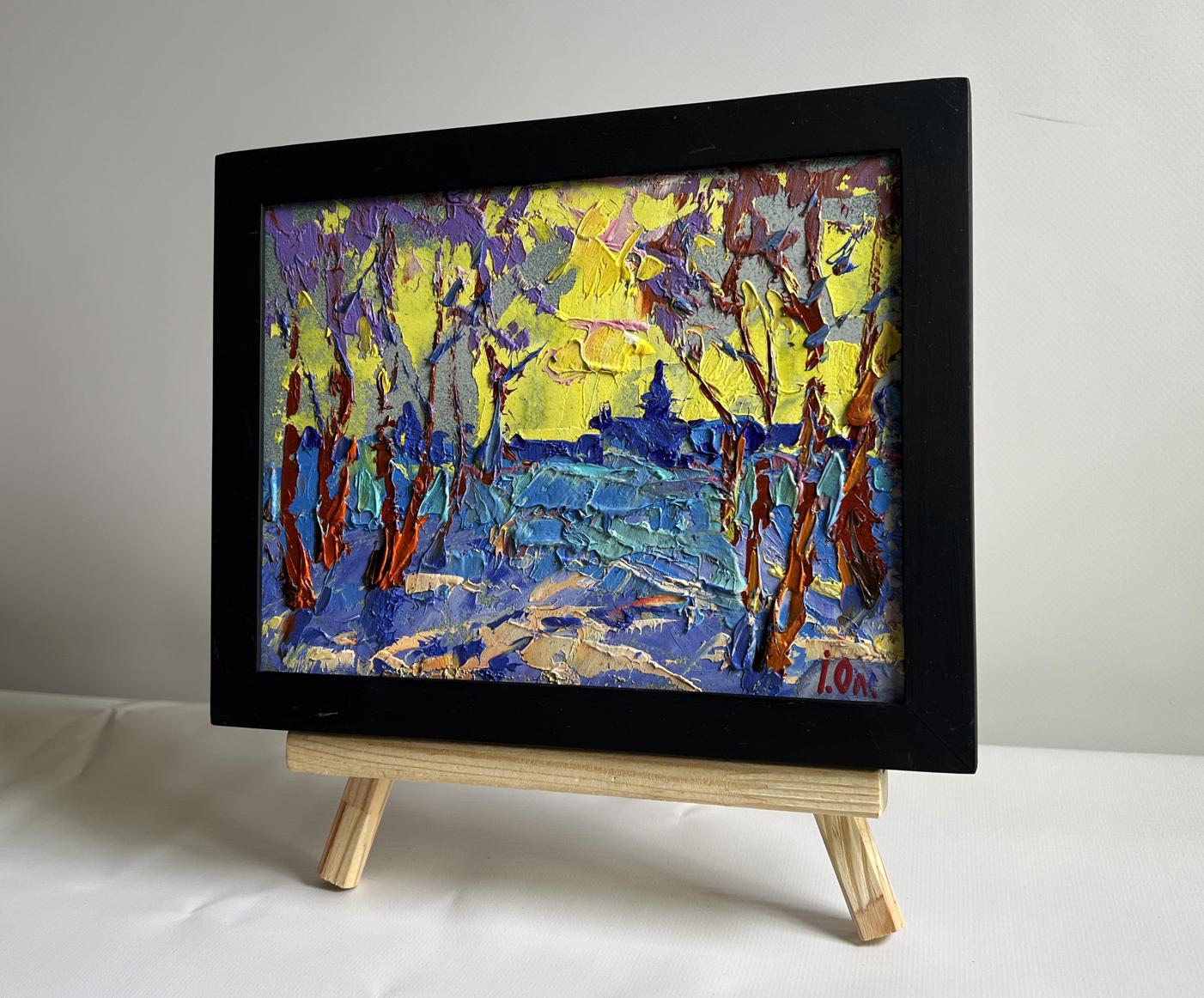 Oil painting Winter evening with yellow sunset by Oleksiy Ivanyuk in black frame