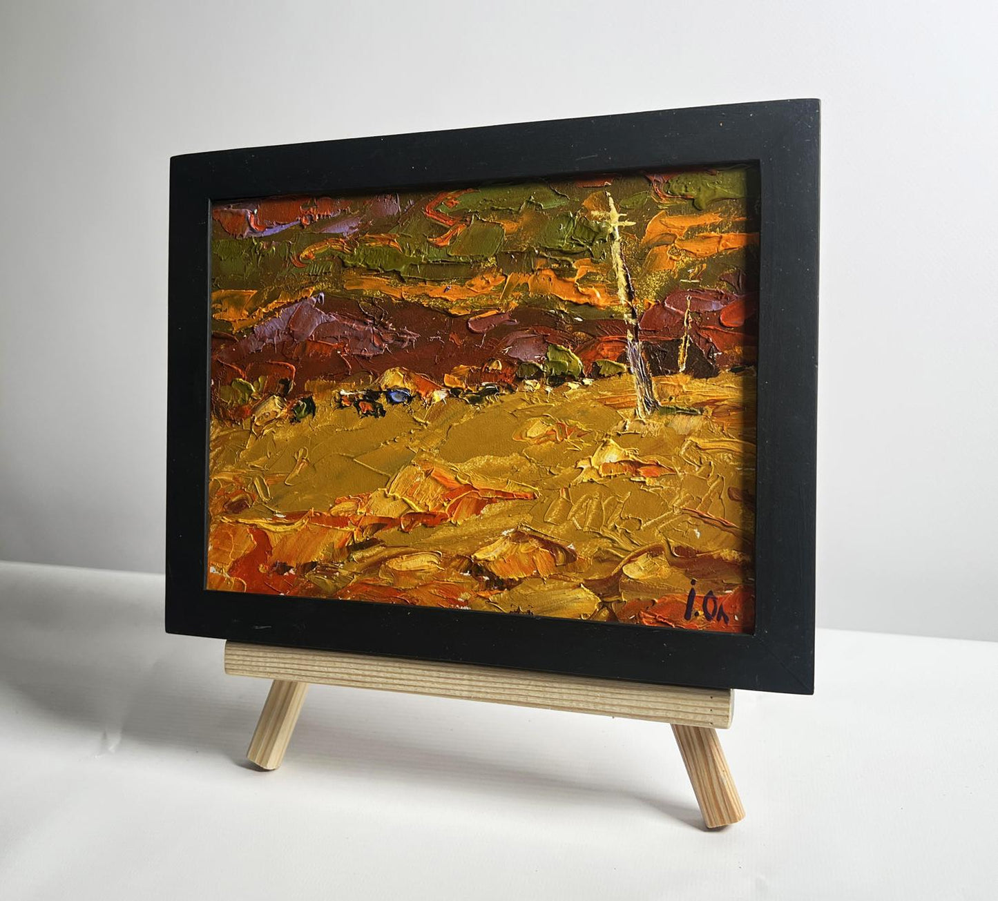 Oil painting of orange sunset over mountains by Oleksiy Ivanyuk