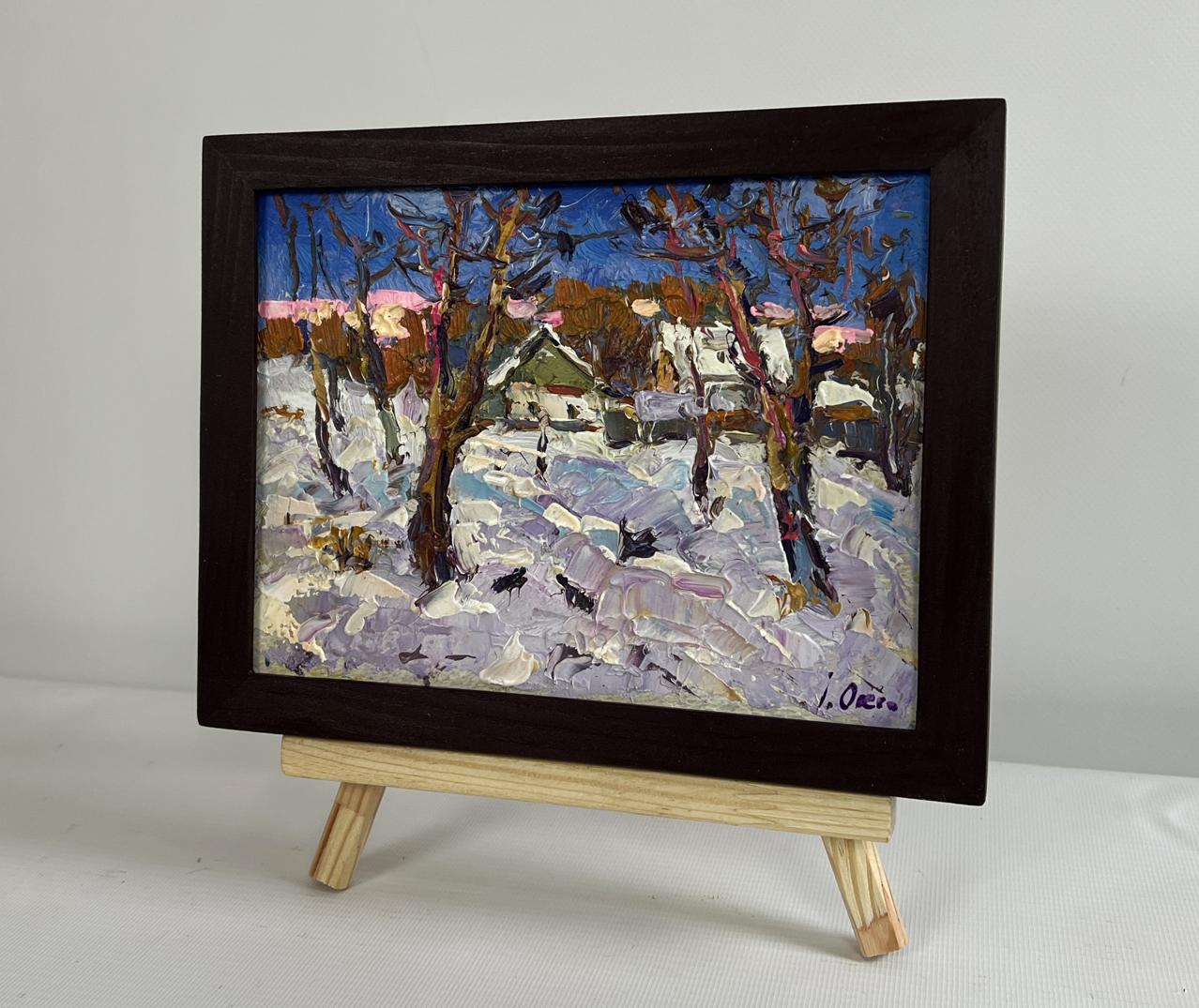 Oil painting by Oksana Ivanyuk: snowy village with crows in bare trees, framed