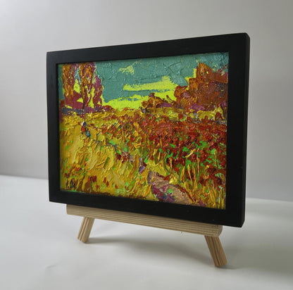 Oil painting Autumn flower fields by Oleksiy Ivanyuk in black frame