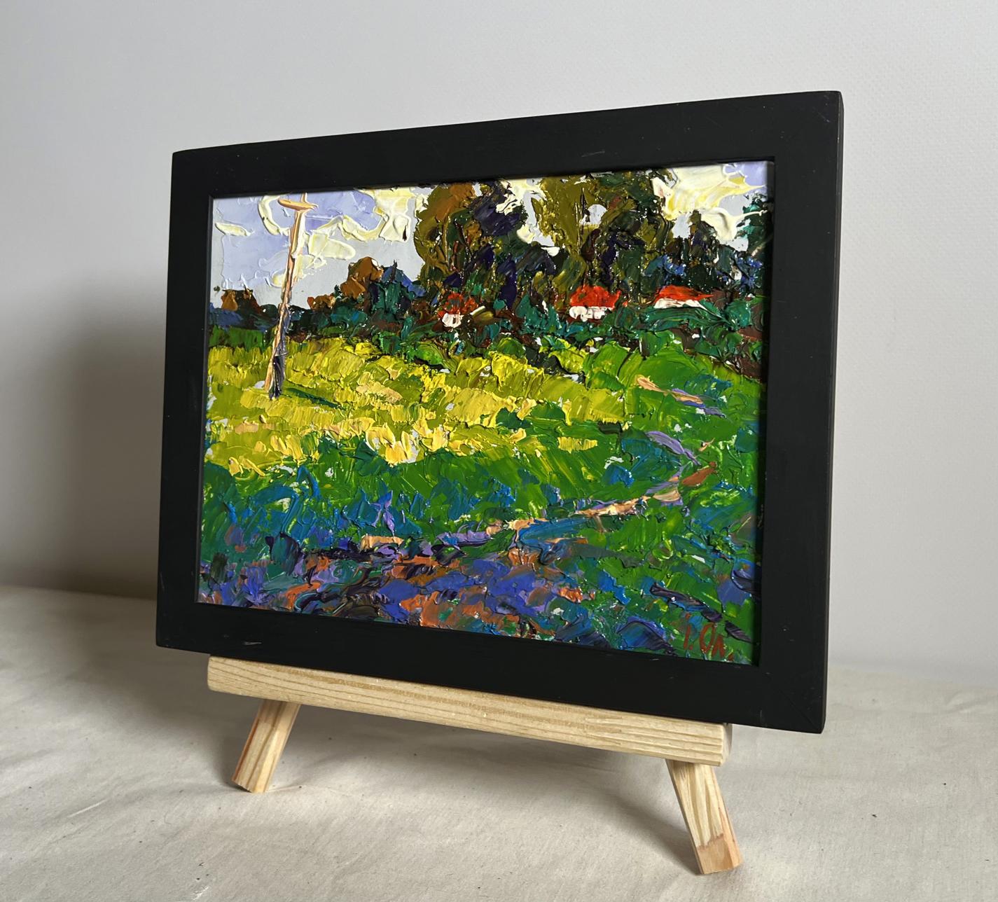 Oil painting Yellow fields near the village by Oleksiy Ivanyuk in black frame