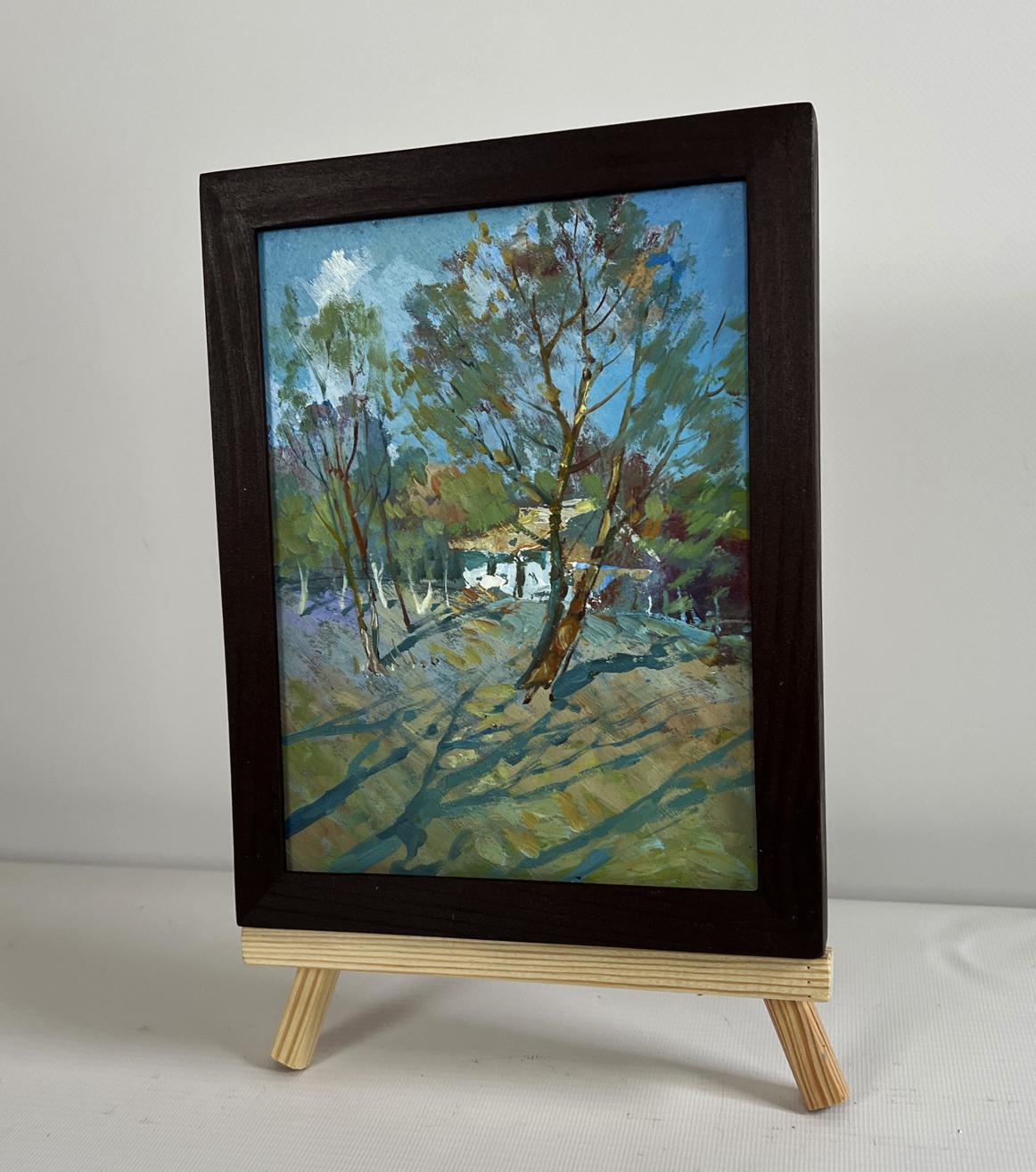 Oil painting In the shade of the trees by Yuriy Suprunchuk on easel