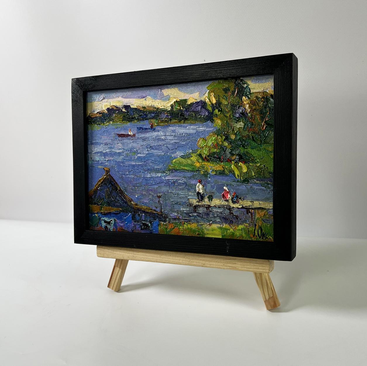 Oil painting Relaxing by the evening river by Oksana Ivanyuk on wooden easel