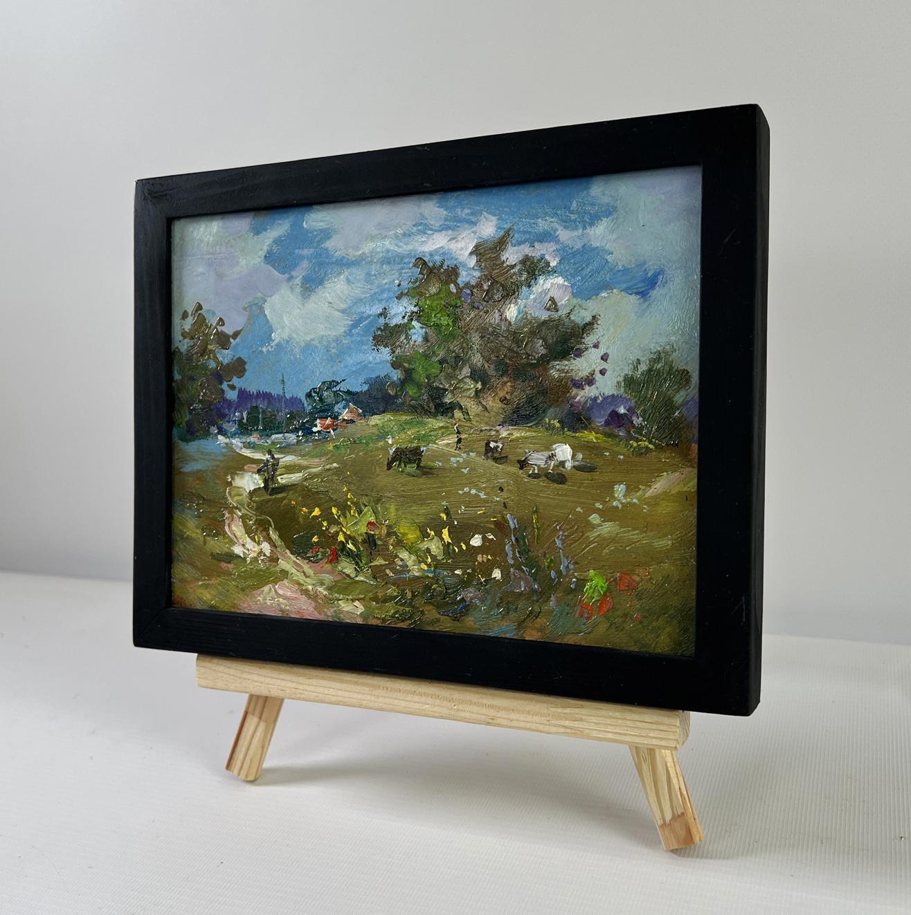 Oil painting Afternoon on the pasture by Yuriy Suprunchuk on wooden easel