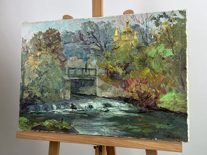 Oil painting Morning rays by Boris Serdyuk: river with golden church spires through autumn trees