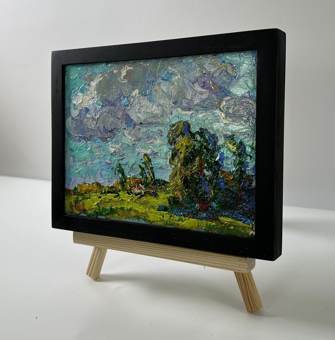 Oil painting Floating clouds by Oksana Ivanyuk with teal sky and green fields