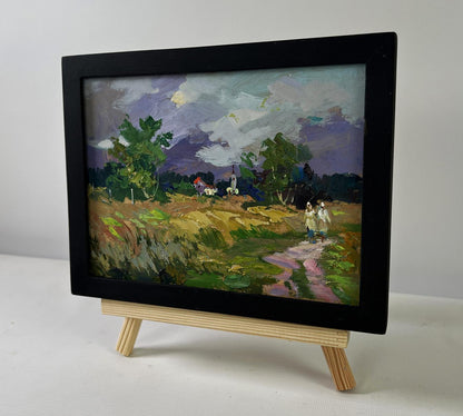 Black-framed miniature oil painting Quiet Village in Endless Expanses by Yuriy Suprunchuk