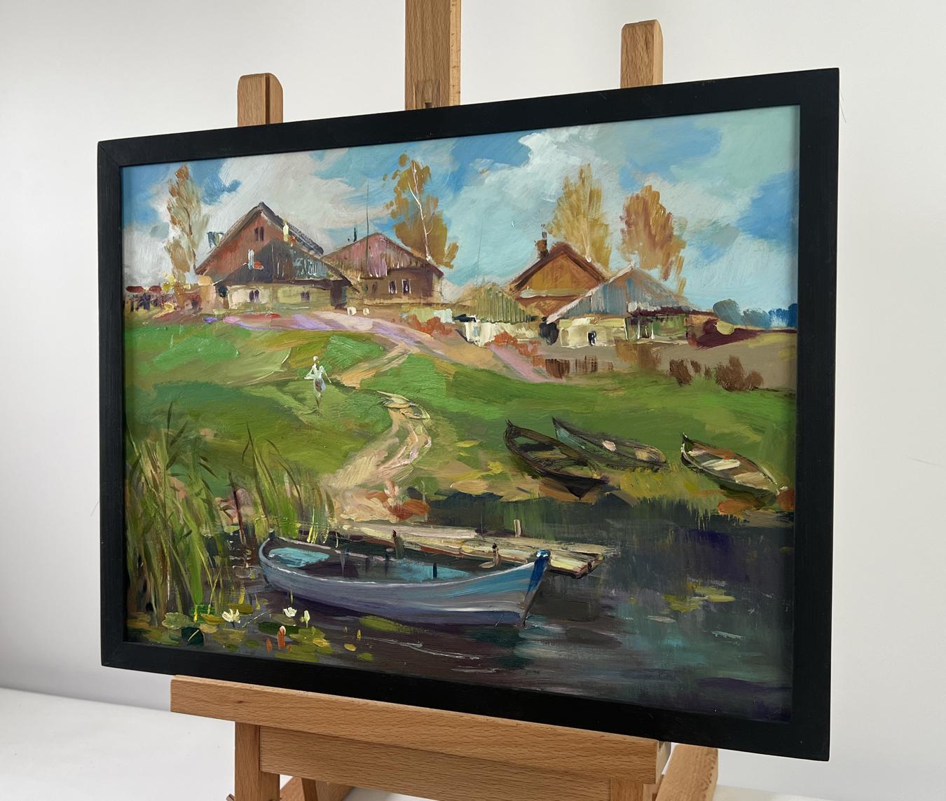 Oil painting of rustic village with boats by Yuriy Suprunchuk