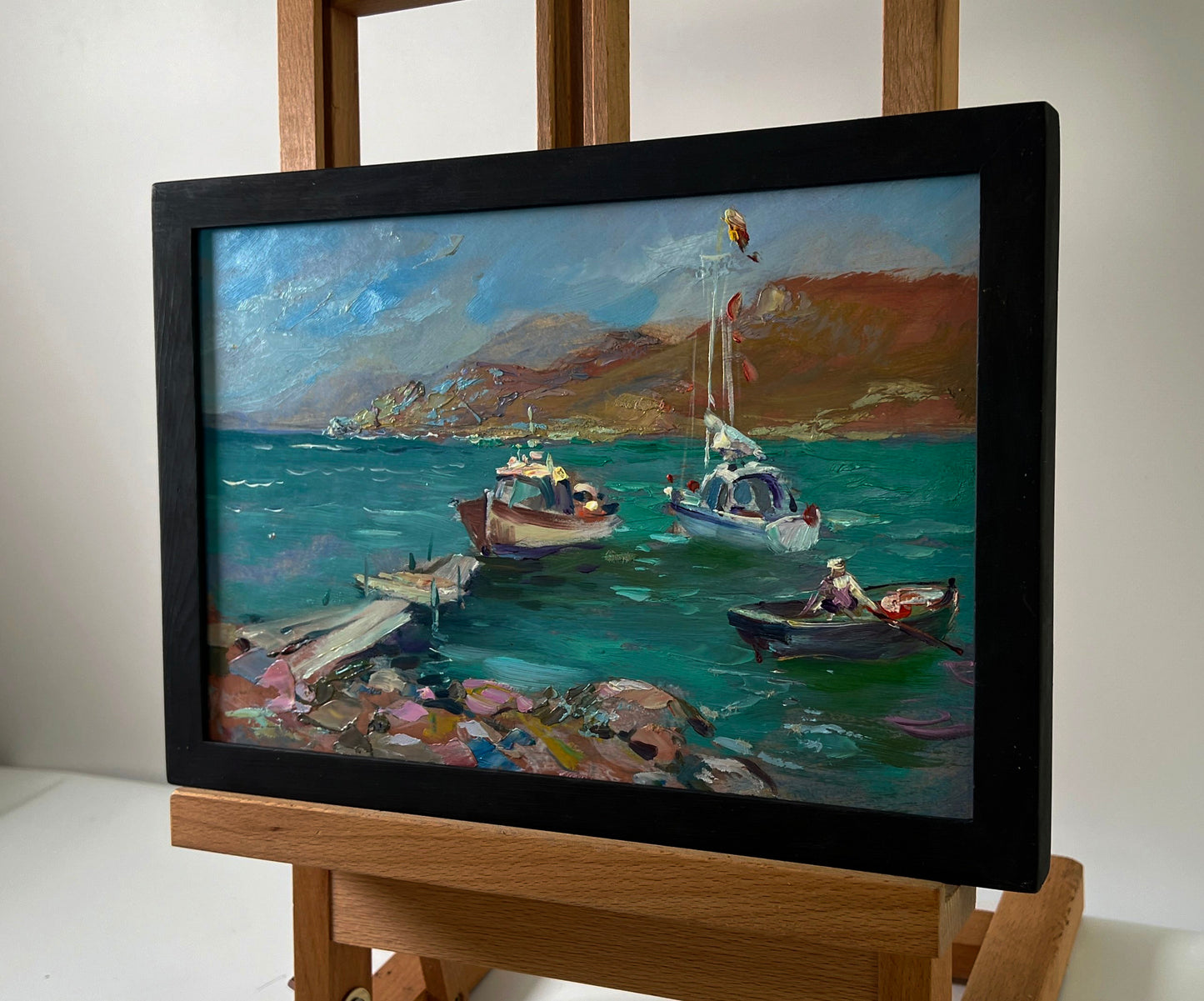 Oil painting Boats on the seashore by Yuriy Suprunchuk in black frame