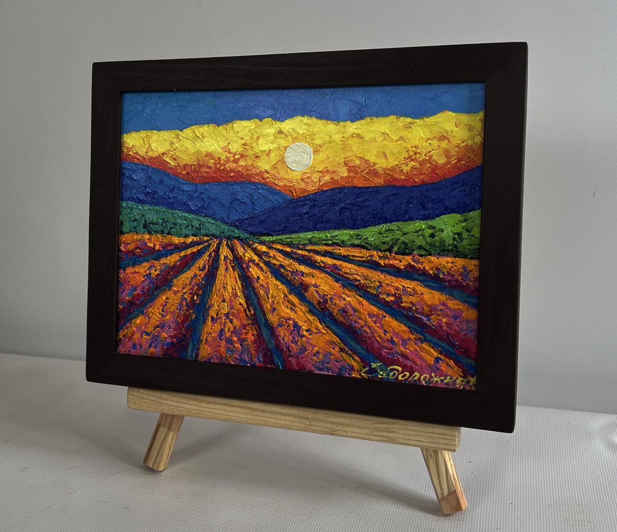Vibrant oil painting of plowed lavender field and blazing sunset by V. Zadorozhnya in dark wooden frame