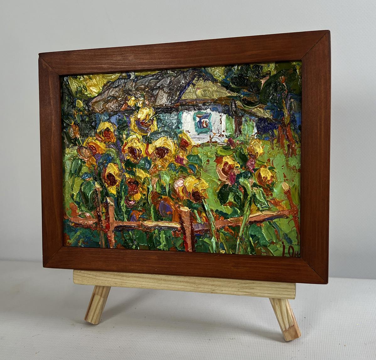 Vibrant oil painting of sunflowers in yard by Oksana Ivanyuk in wood frame