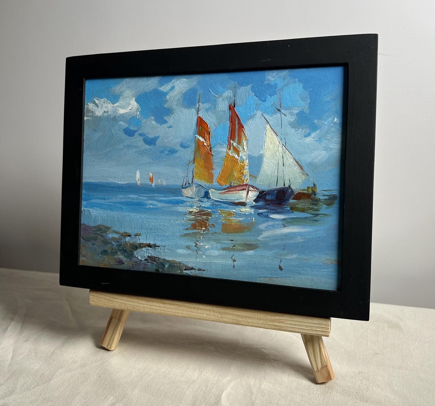 Framed oil painting On a Journey by Sea by Yuriy Suprunchuk on easel