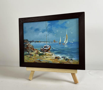 Oil painting Preparing for a sea voyage by Yuriy Suprunchuk in dark frame