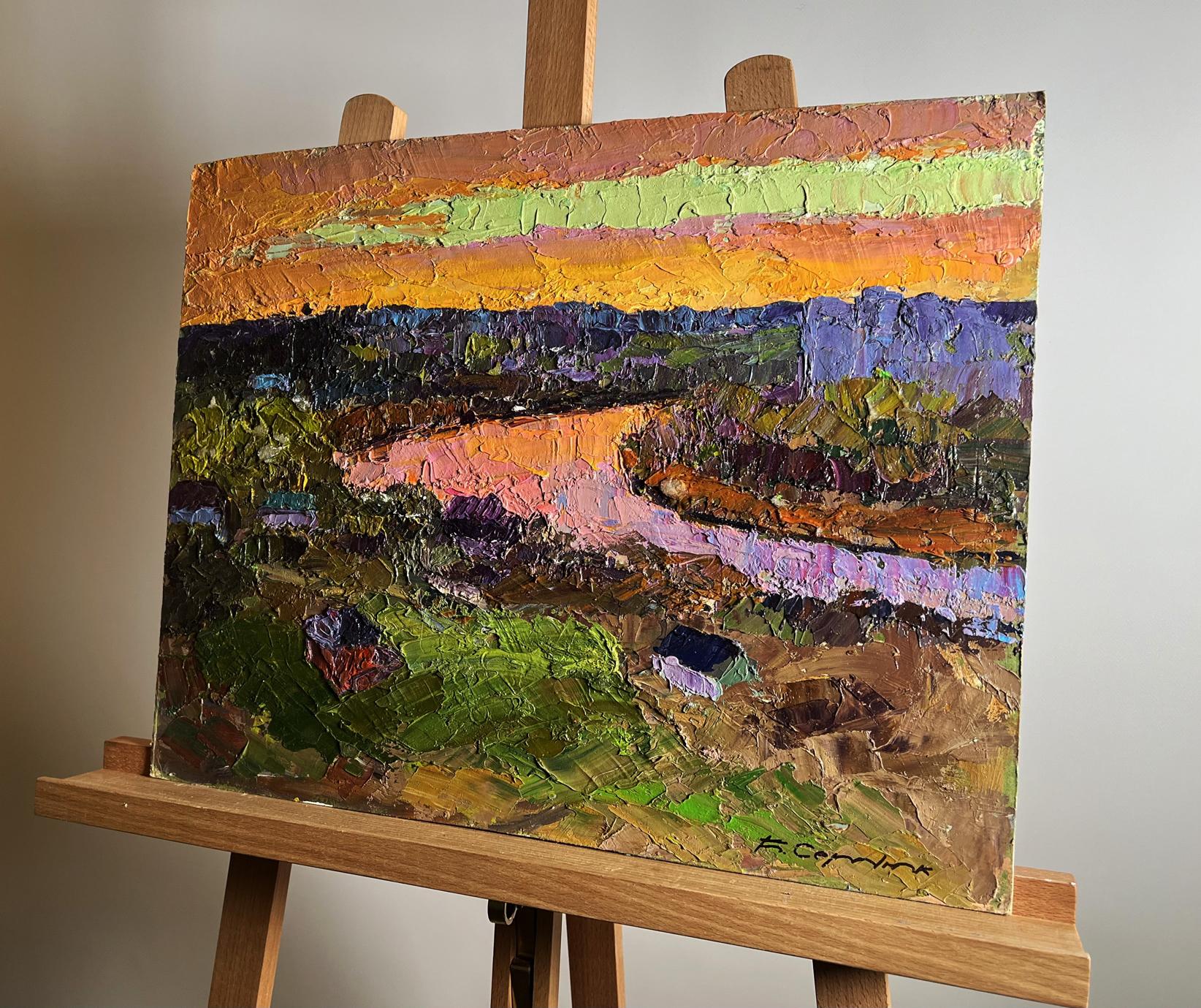 Vibrant oil painting of orange sunset landscape by Boris Serdyuk on easel