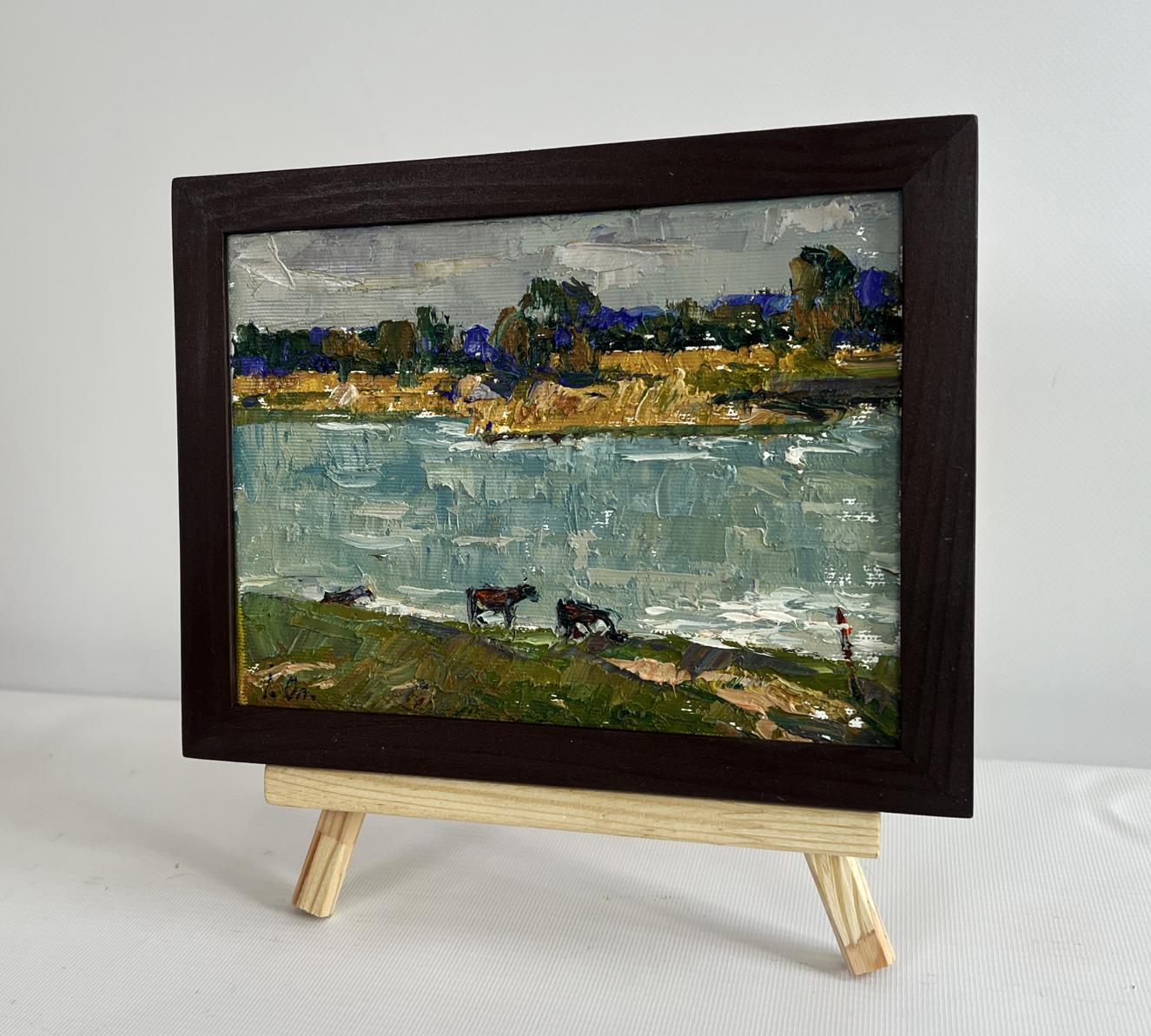 Oil painting At the watering hole by Oleksiy Ivanyuk with cows near water