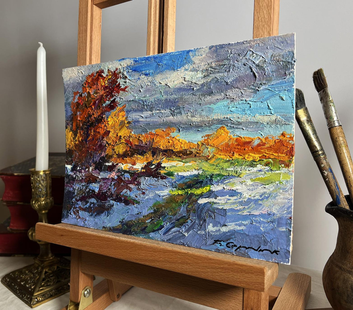 Oil painting The first snow fell by Boris Serdyuk on wooden easel