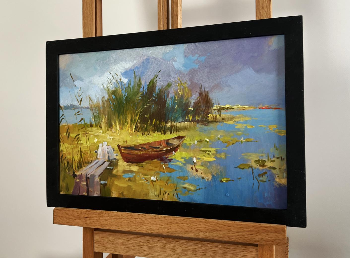 Framed oil painting A boat among the reeds by Yuriy Suprunchuk