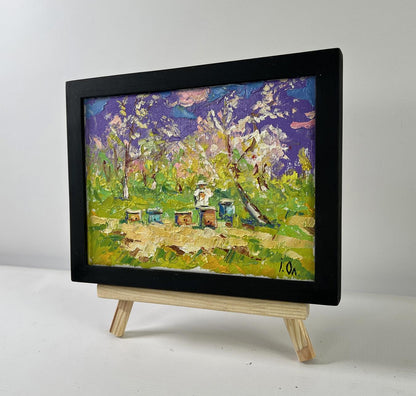 Oil painting Breath of Spring by Oleksiy Ivanyuk: beekeeping in orchard