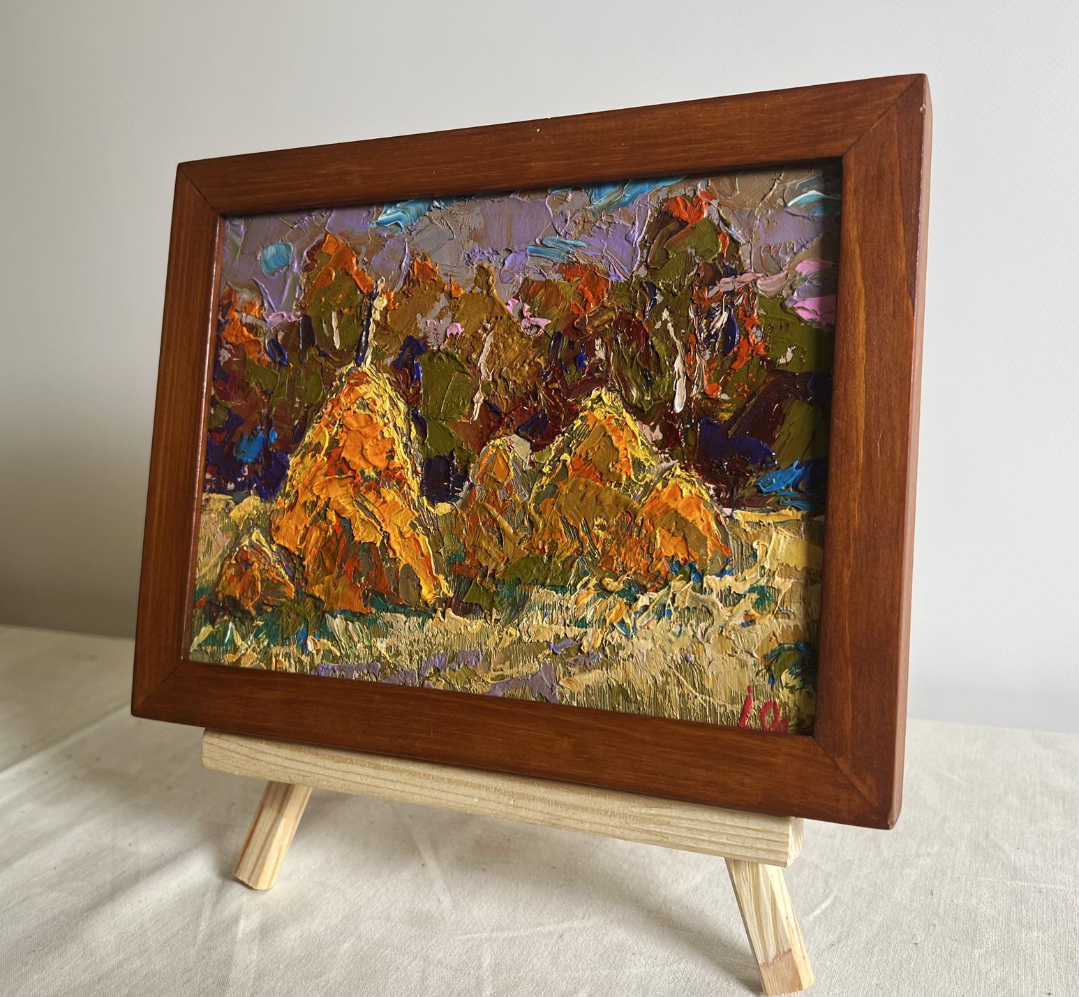 Oil painting Haystacks in the field by Oleksiy Ivanyuk in wooden frame