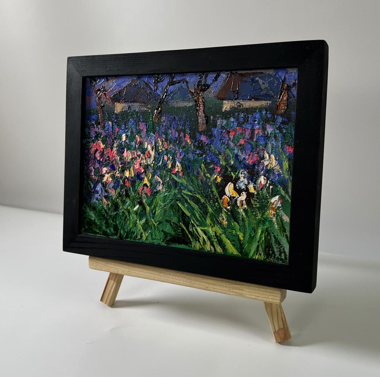 Oil painting Flowers in the village by Oleksiy Ivanyuk: black-framed irises