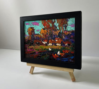 Oil painting Evening village by Oksana Ivanyuk in black frame