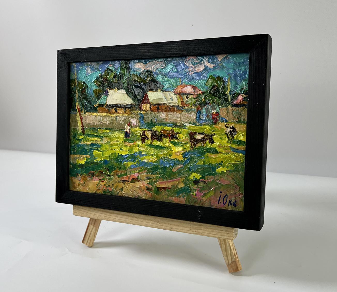 Oil painting by Oksana Ivanyuk: cows graze in vibrant rural fields