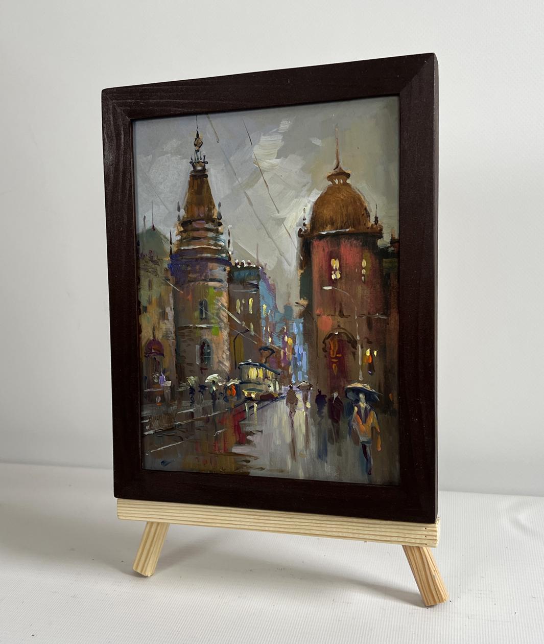 Oil painting Dynamics of urban life by Yuriy Suprunchuk on wooden easel
