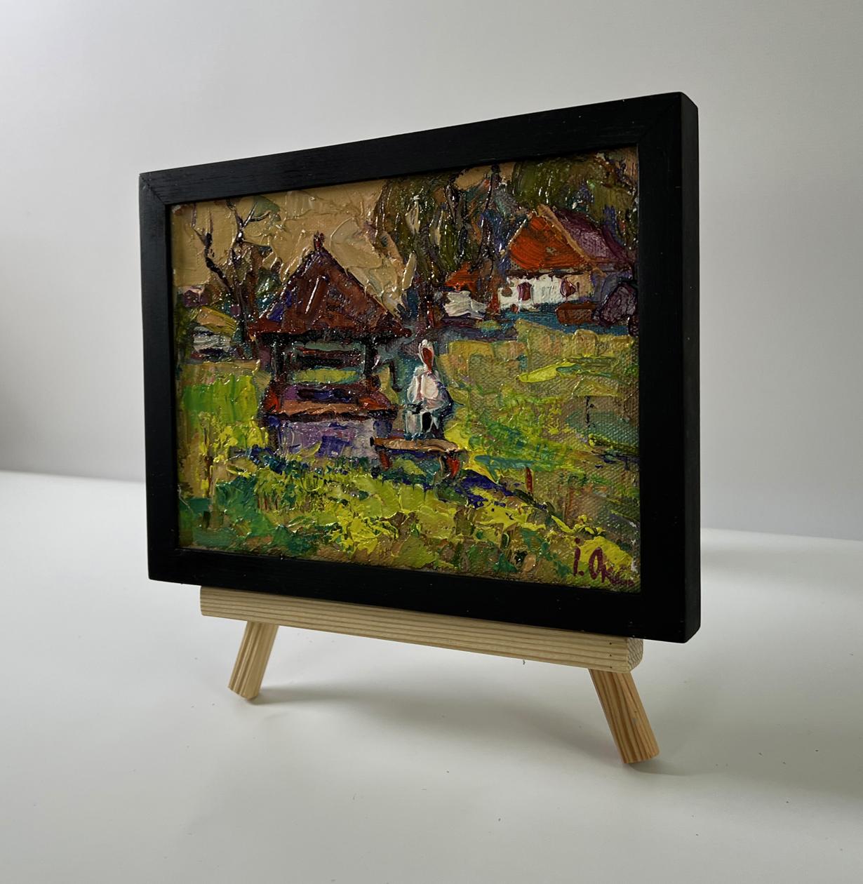 Oil painting of village everyday life by Oksana Ivanyuk on wooden easel