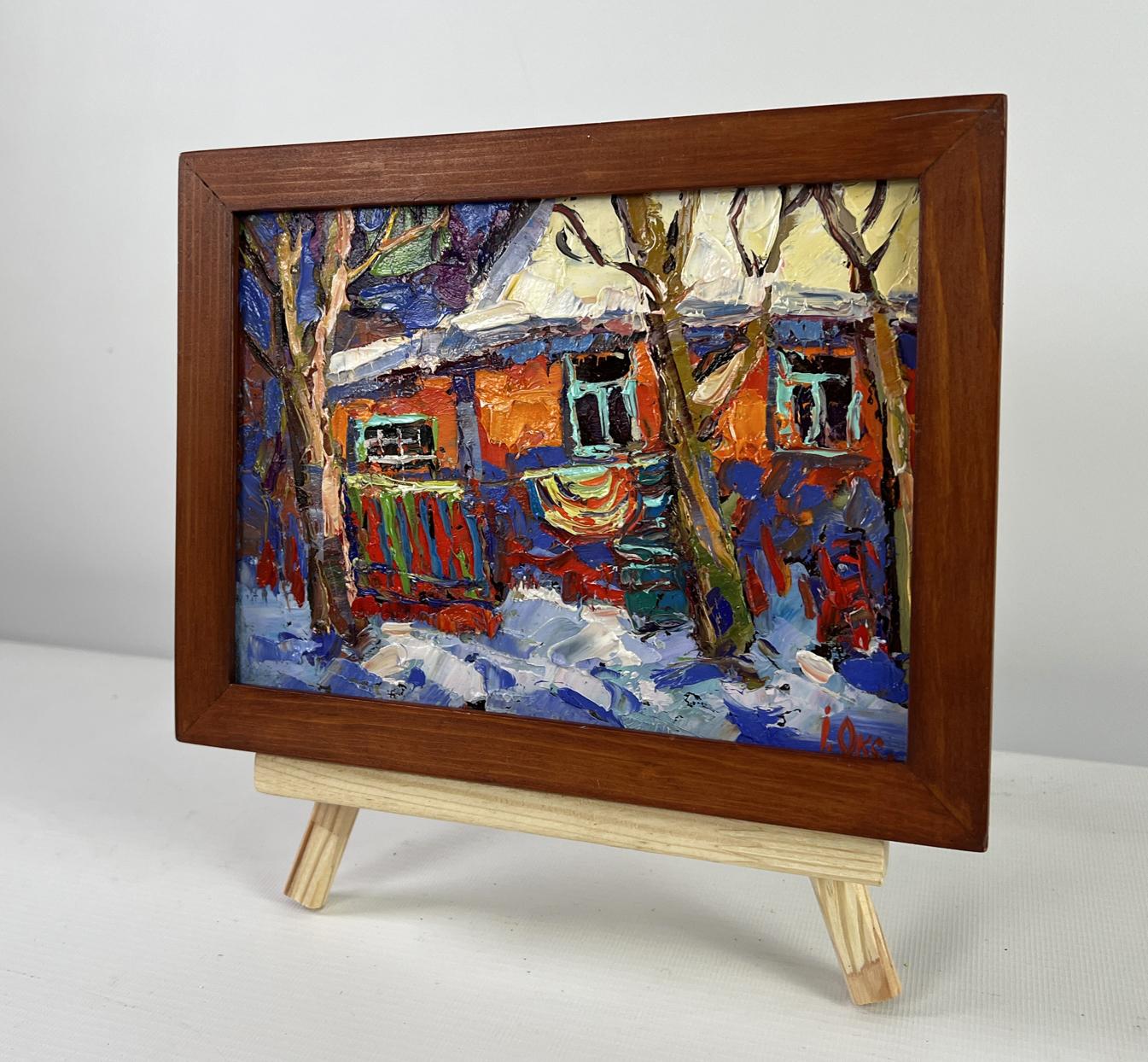 Vibrant oil painting of snowy house in winter morning by Oksana Ivanyuk