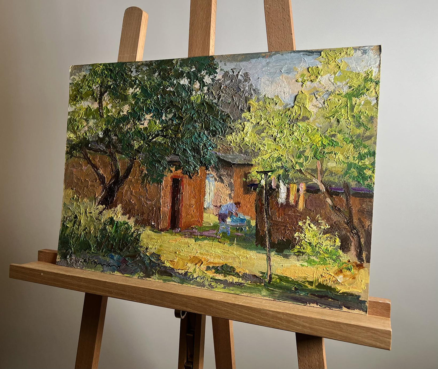 Oil painting Summer holidays in the village by Boris Serdyuk, sunlit courtyard