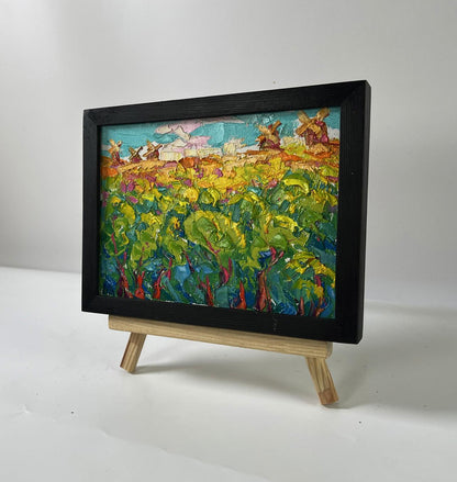 Vibrant impressionist Oleksiy Ivanyuk oil painting of Dutch fields and windmills in black frame