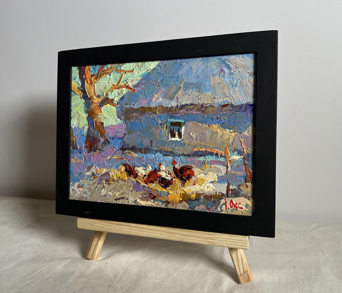 Oil painting Frost in the yard by Oksana Ivanyuk on wooden easel