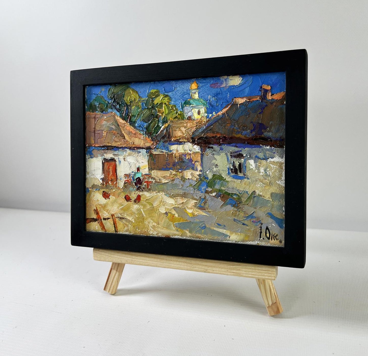 Oil painting Warmth in the yard by Oksana Ivanyuk on wooden easel