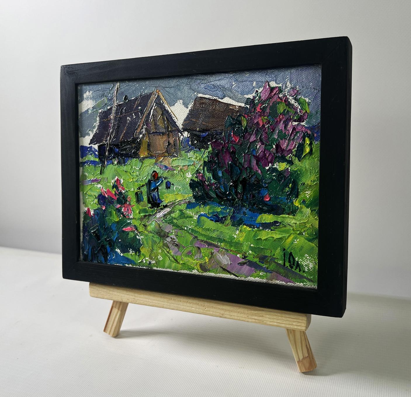 Black-framed Oleksiy Ivanyuk oil painting of cool evening village scene