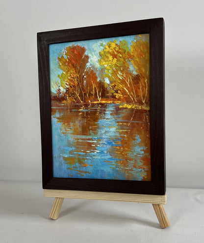 Oil painting Golden reflection of the forest by Yuriy Suprunchuk in dark frame