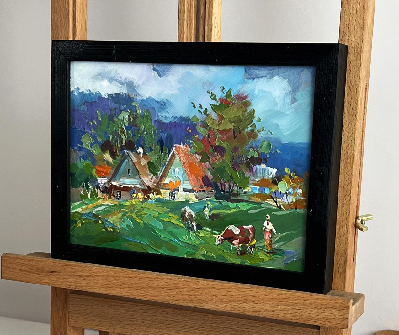Vibrant impressionist oil painting by Yuriy Suprunchuk: cows grazing in village, framed