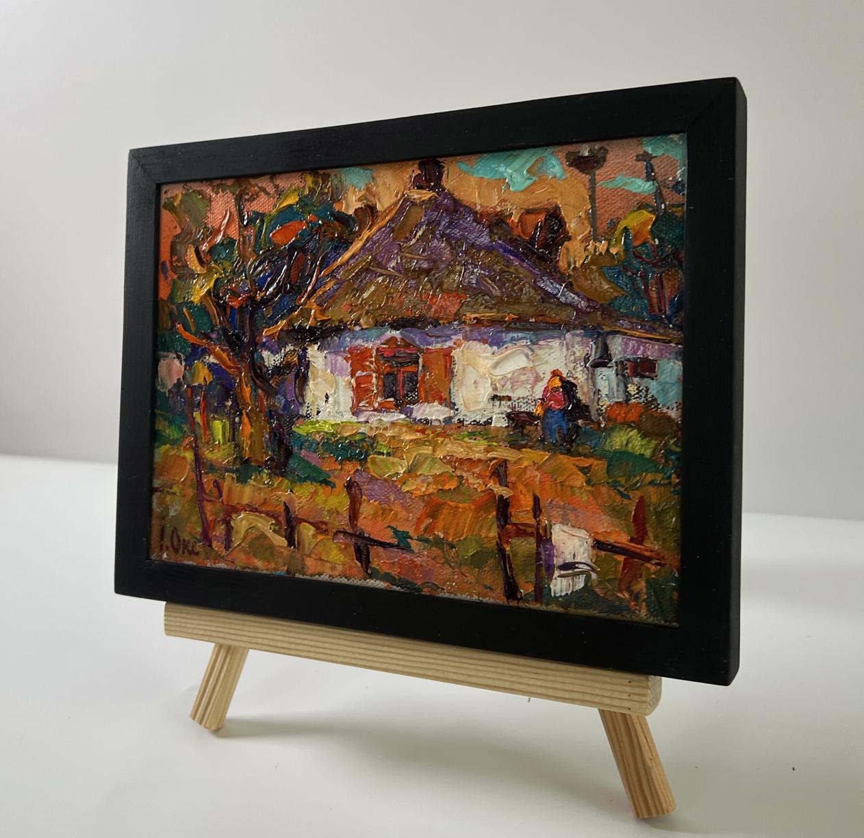Oil painting Evening in the Yard by Oksana Ivanyuk, rustic autumn house on easel