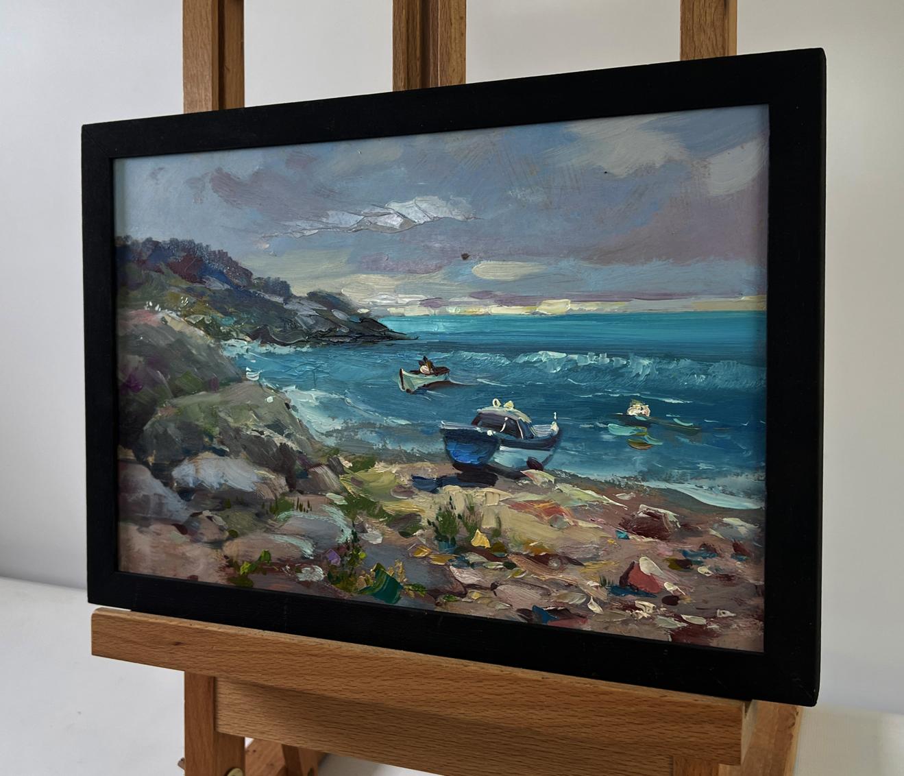 Oil painting of sea waves crashing on sharp shores by Yuriy Suprunchuk in black frame