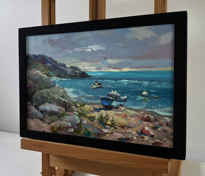 Oil painting of sea waves crashing on sharp shores by Yuriy Suprunchuk in black frame