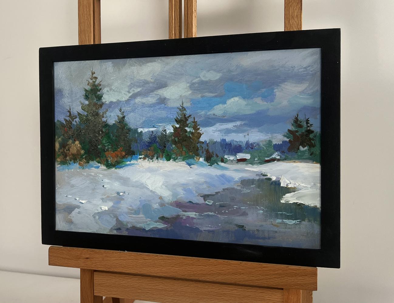 Framed oil painting of snowy river landscape by Yuriy Suprunchuk