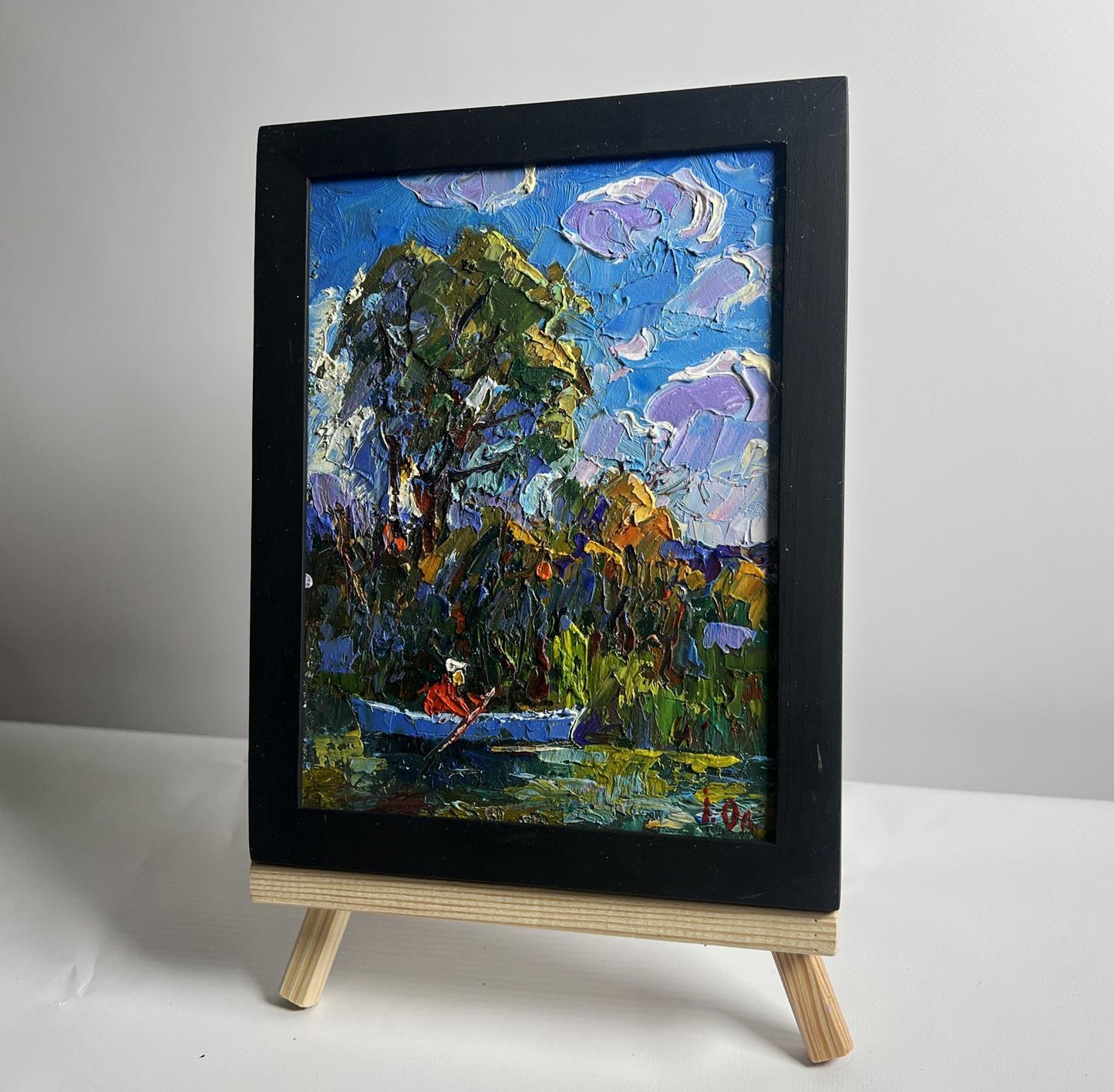 Oil painting Early morning on a boat by Oleksiy Ivanyuk in black frame