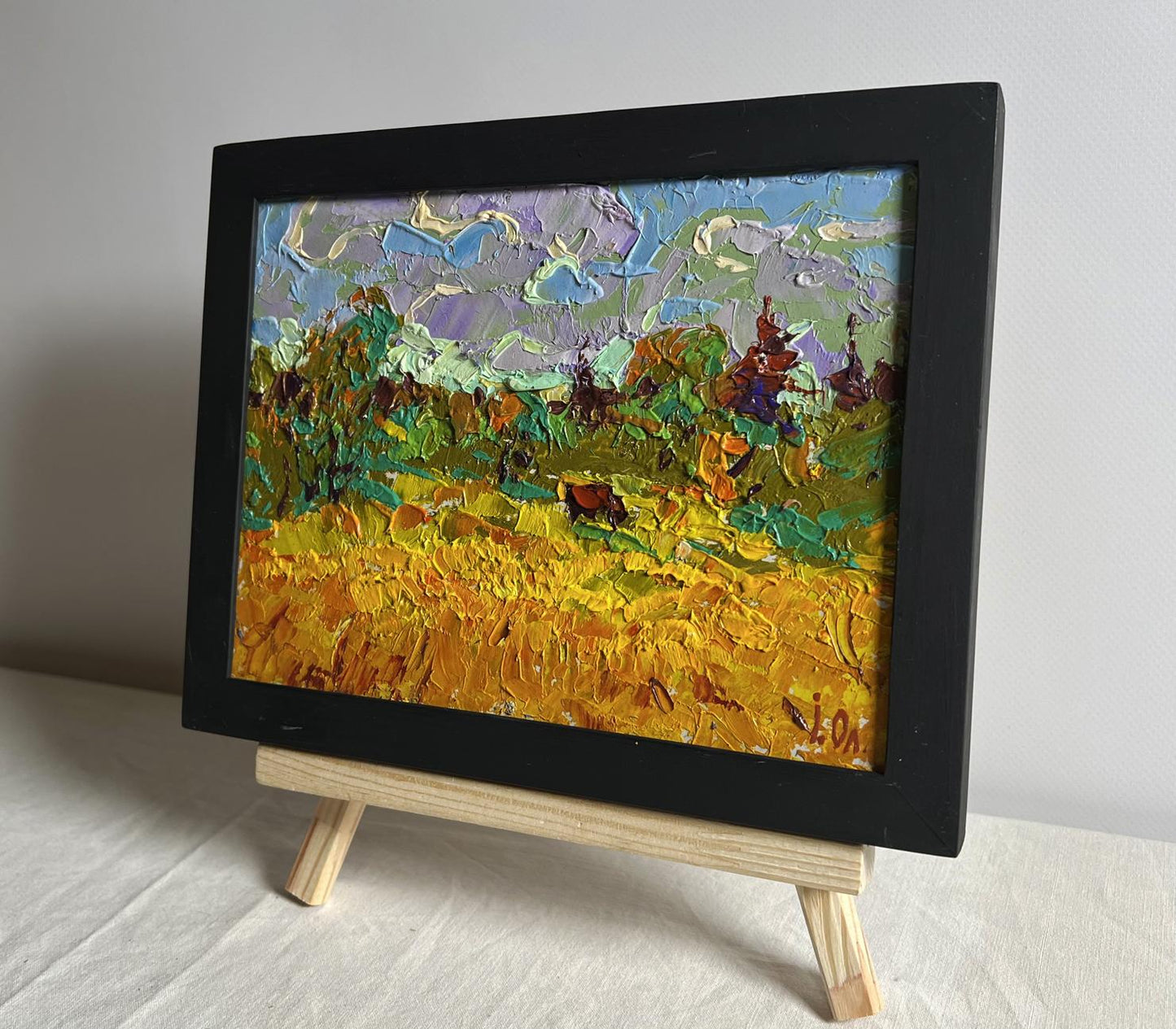 Vibrant Field and Forests oil painting by Oleksiy Ivanyuk in black frame