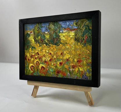 Oil painting Flowers of the Sun by Oleksiy Ivanyuk, vibrant sunflower field in black frame