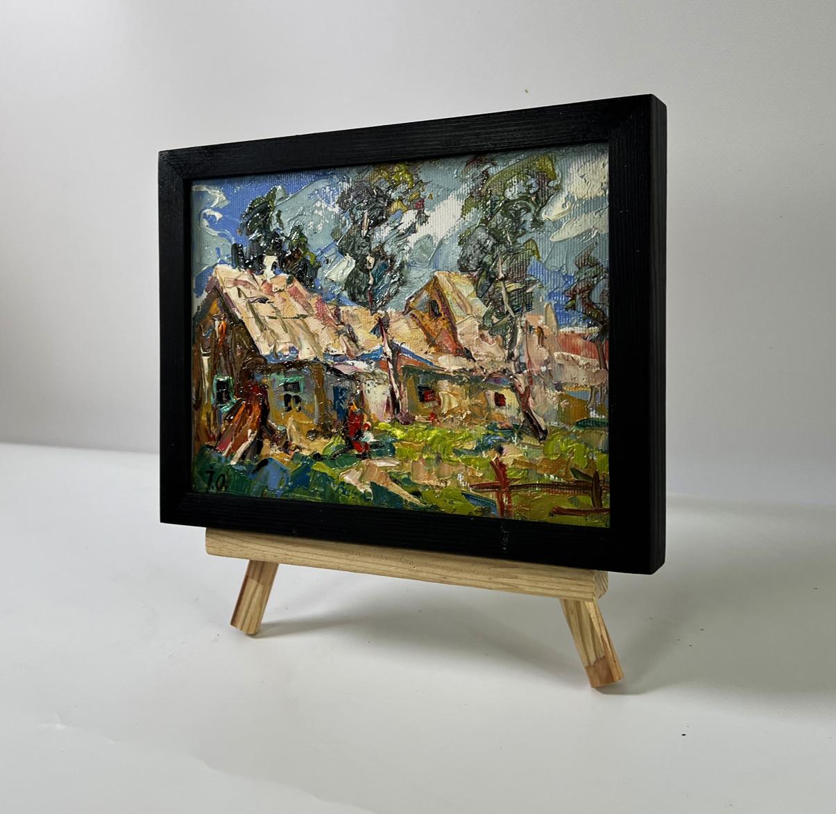 Oil painting of village courtyard by Oleksiy Ivanyuk on wooden easel