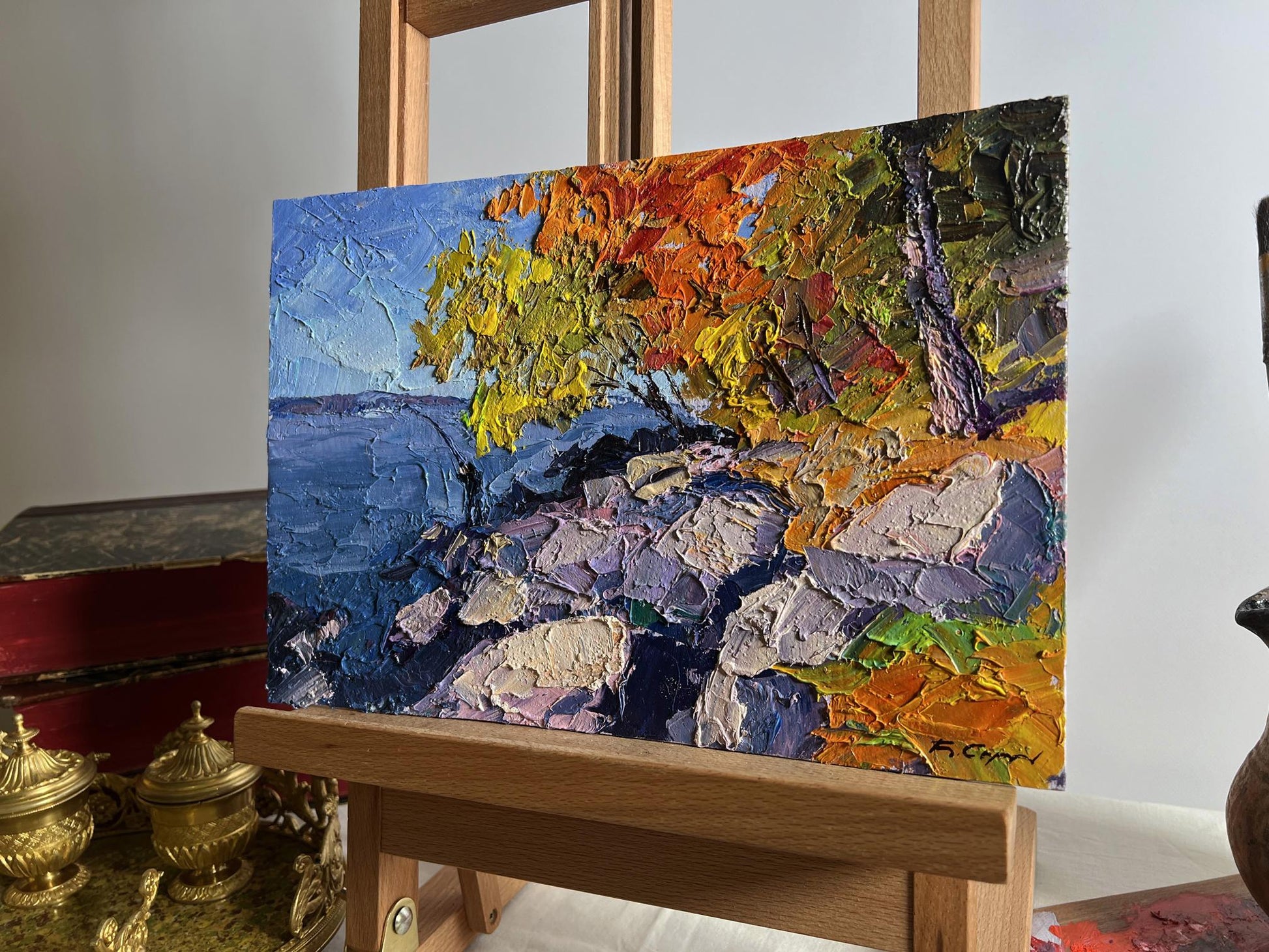 Vibrant impressionist oil painting Autumn fishing by Boris Serdyuk on easel