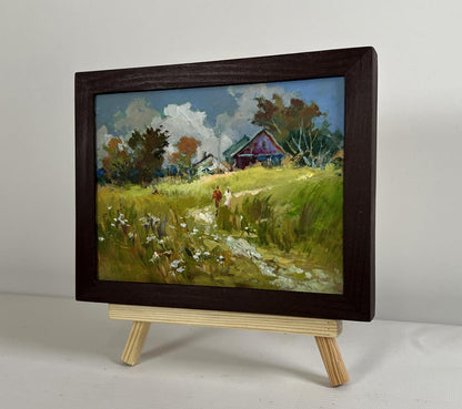 Rustic oil painting by Yuriy Suprunchuk of couple in pastoral field