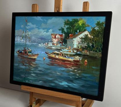 Framed oil painting of river ships near shore by Yuriy Suprunchuk