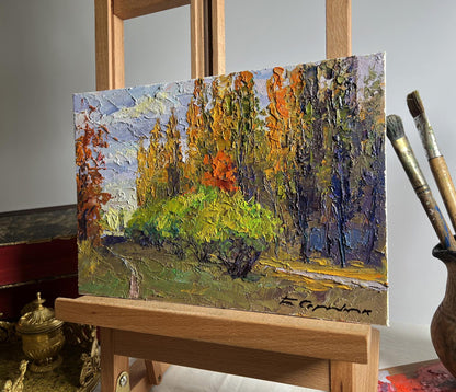 Oil painting of autumn city park by Boris Serdyuk, vibrant orange foliage