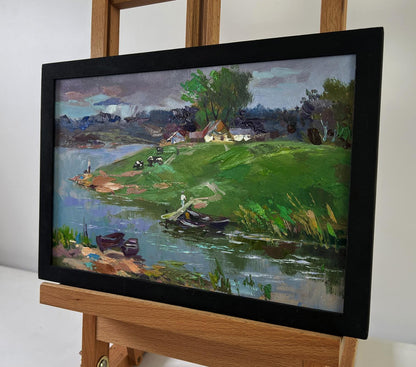 Oil painting by Yuriy Suprunchuk: serene lakeside village on quiet shore