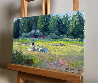 Oil painting Preparing for Winter by Boris Serdyuk: textured green trees and pastel field